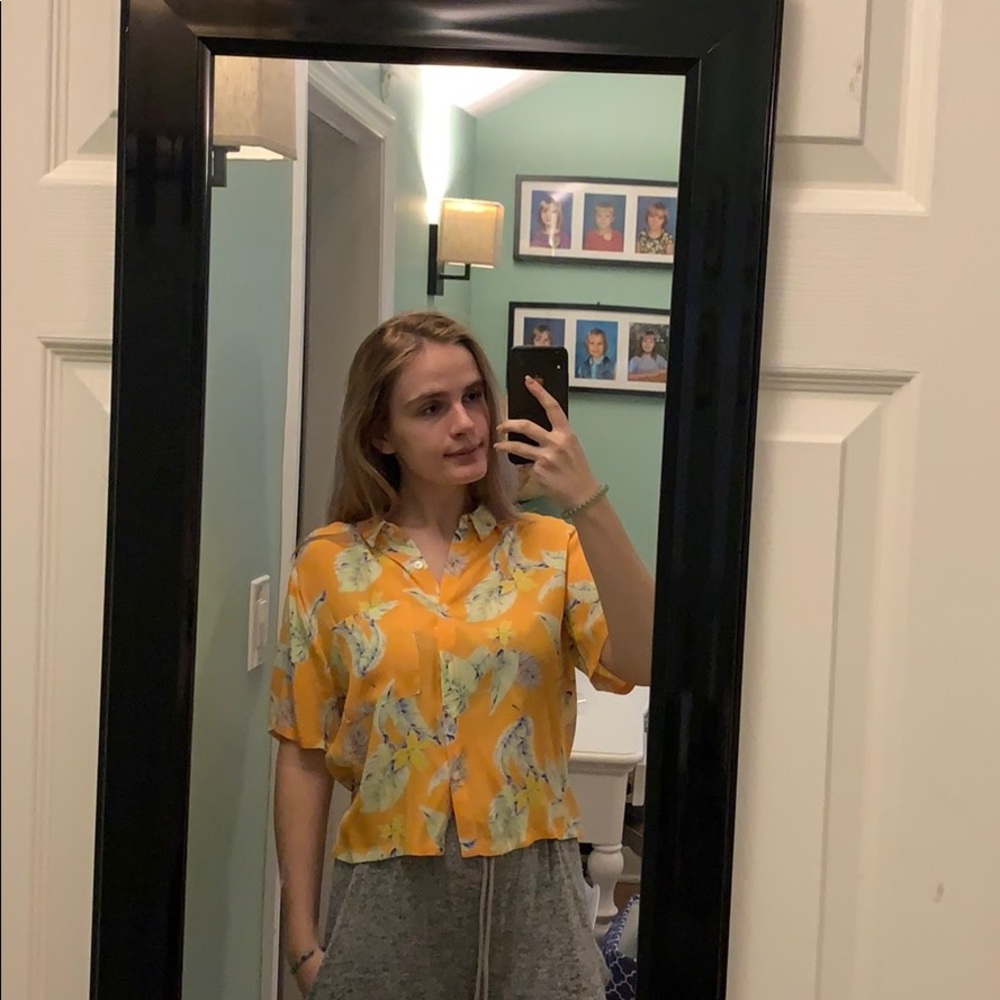 An orange/yellow blouse